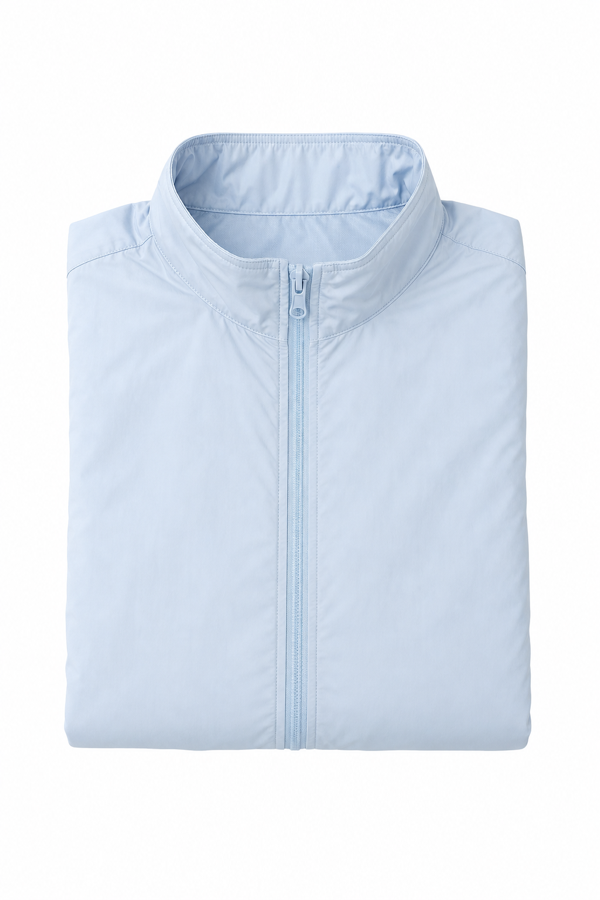 Folded light blue travel jacket.